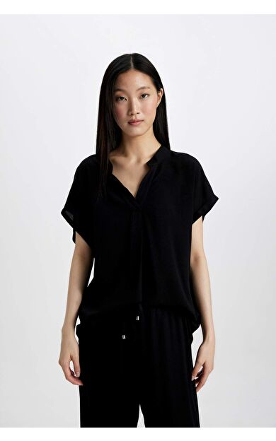 DeFacto Regular Fit Bisiklet Yaka Krinkıl Kumaş Kısa Kollu Bluz