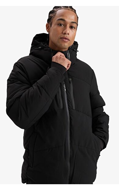 DeFacto Defactofit Su Geçirmez Rüzgar Geçirmez Slim Fit Dar Kesim Kapüşonlu Fermuarlı Cepli Kışlık Mont