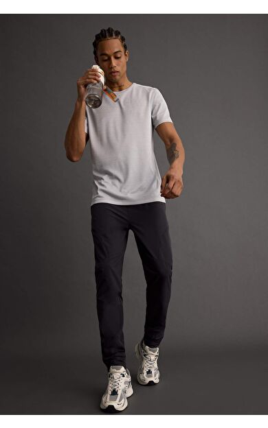 DeFacto DeFactoFit Slim Fit Dar Kesim Çift Cepli Fermuarlı Paça Dokuma Jogger B2780AX25AUAR231