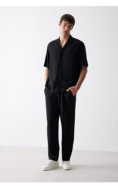 DeFacto Yazlık Viskon Jogger Pantolon Regular Fit Normal Kesim Keten Karışımlı Düz Paça Cepli B4867AX25SMBK81