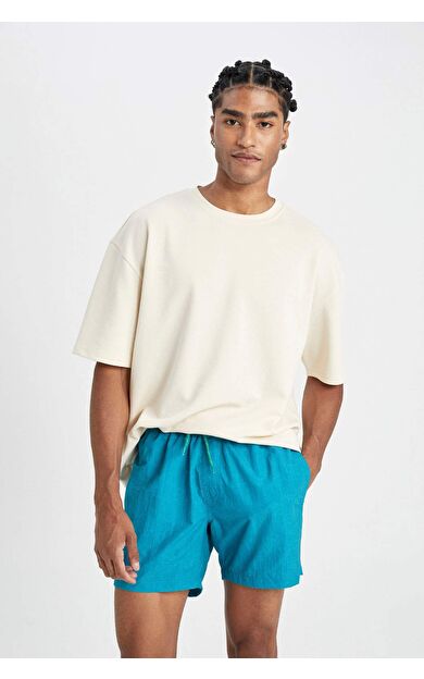 DeFactoFit Yıkamalı File Astarlı Kısa Boy Deniz Şortu C0316AX24HSGN1046