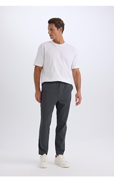 DeFacto Relax Fit Rahat Kesim Düz Paça Krinkıl Yazlık Kumaş Pantolon C3930AX25SPAR15