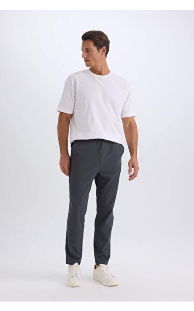 DeFacto Relax Fit Rahat Kesim Düz Paça Krinkıl Yazlık Kumaş Pantolon C3930AX25SPAR15