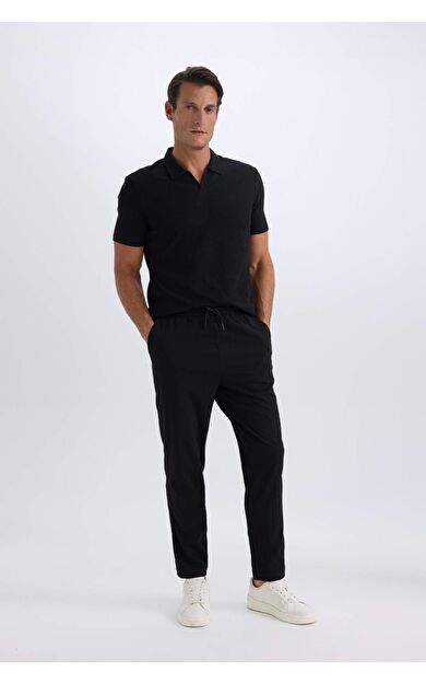 DeFacto Relax Fit Rahat Kesim Düz Paça Krinkıl Yazlık Kumaş Pantolon C3930AX25SPBK27