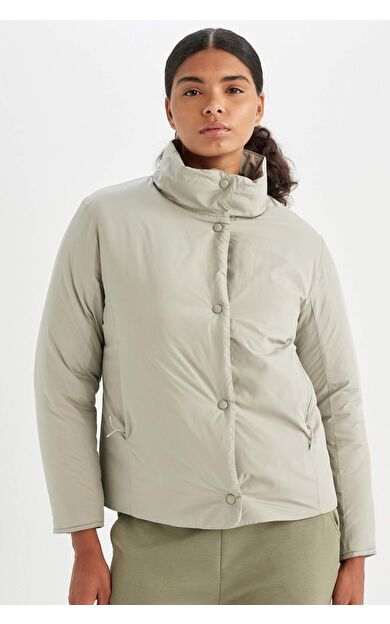 DeFactoFit Su İtici Dik Yaka Çıtçıt Kapamalı Cepli Hafif Mont