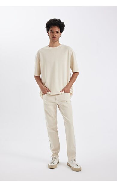 DeFacto Slim Tapered Fit Dar Kalıp Normal Bel Daralan Paça Jean Pantolon C9743AX24AUBG714