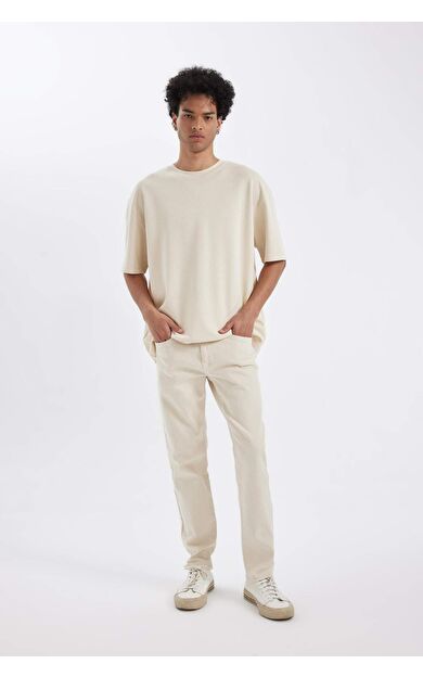 DeFacto Slim Tapered Fit Dar Kalıp Normal Bel Daralan Paça Jean Pantolon C9743AX24AUBG714