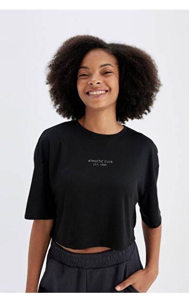 DeFacto DeFactoFit Oversize Fit Bisiklet Yaka Slogan Baskılı Sporcu Modal Kısa Kollu Tişört