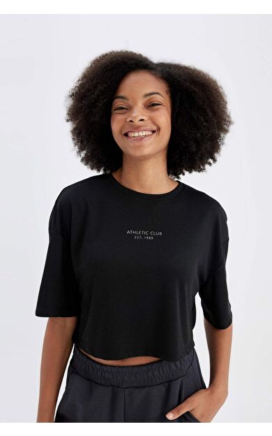 DeFactoFit Oversize Fit Bisiklet Yaka Slogan Baskılı Sporcu Modal Kısa Kollu Tişört