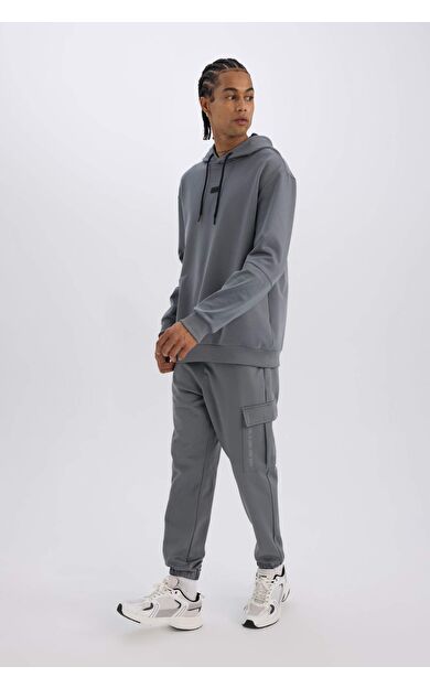 DeFactoFit Sporcu Jogger Eşofman Altı Standart Fit Üç Cepli Beli Bağcıklı Lastikli Paça D3741AX24WNGR211