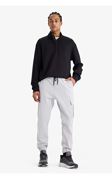 DeFactoFit Sporcu Jogger Eşofman Altı Standart Fit Üç Cepli Beli Bağcıklı Lastikli Paça D3741AX24WNGR523