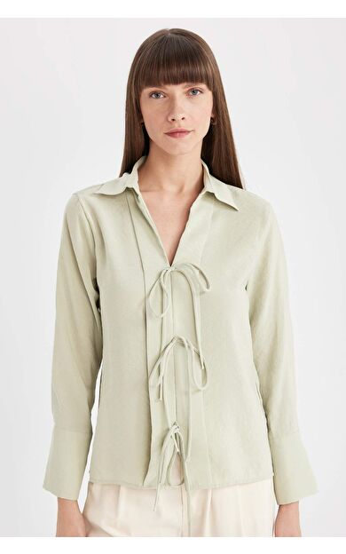 DeFacto DeFactoFit Regular Fit Yuvarlak Yaka Krinkıl Viskon Kolsuz Bluz