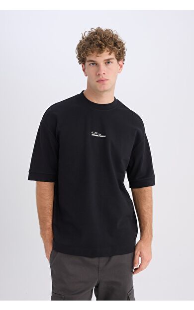 DeFacto Loose Fit Bisiklet Yaka Baskılı Ağır Kumaş Kısa Kollu Tişört D5496AX25SPBK81