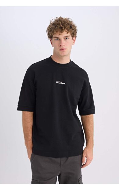 DeFacto Loose Fit Bisiklet Yaka Baskılı Ağır Kumaş Kısa Kollu Tişört D5496AX25SPBK81