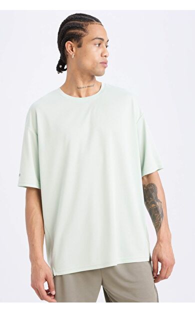 DeFactoFit Boxy Fit Bisiklet Yaka Arma Baskılı Baskılı Sporcu Kısa Kollu Tişört D6726AX25SPGN1000