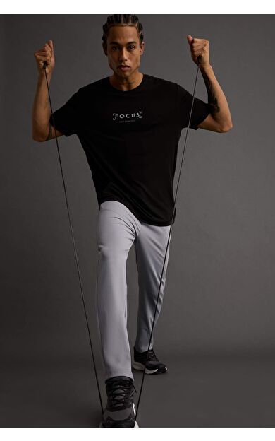 DeFacto DeFactoFit Slim Fit Dar Kesim Standart Paça Sporcu Jogger Eşofman Altı D7238AX25AUGR455
