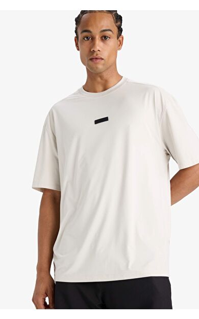 DeFactoFit Boxy Fit Bisiklet Yaka Baskılı Sporcu Kısa Kollu Tişört D7365AX25SPBG721