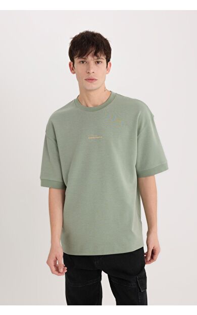 DeFacto Loose Fit Bisiklet Yaka Baskılı Ağır Kumaş Tişört D8462AX25SPGN1107