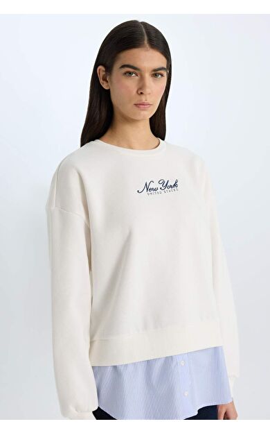 DeFacto Kadın Relax Fit Bisiklet Yaka Etek Ucu Detaylı Baskılı Kalın Casual Sweatshirt