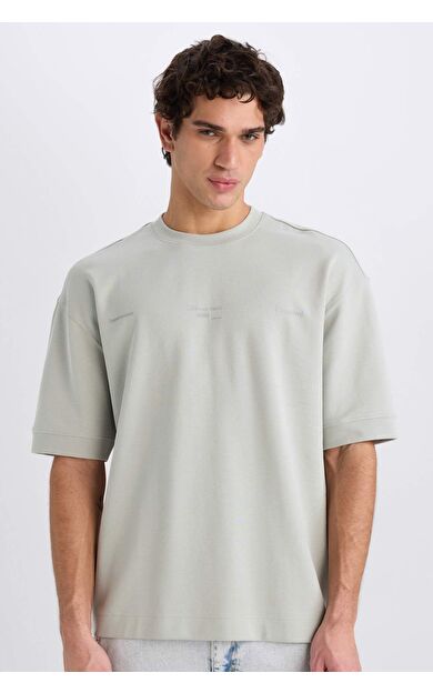 DeFacto Loose Fit Bisiklet Yaka Baskılı Kısa Kollu Ağır Kumaş Tişört E0575AX25SMGN1255