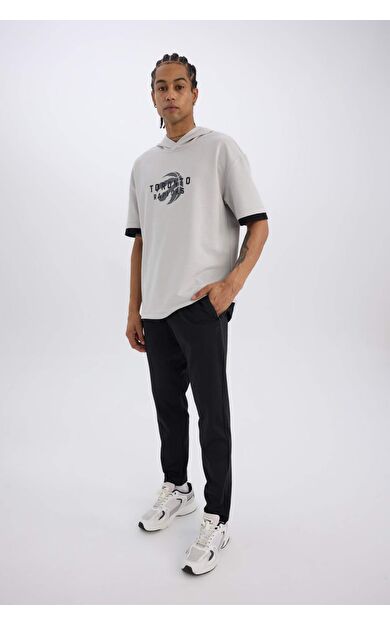 DeFacto DeFactoFit Sporcu Jogger Eşofman Altı Slim Fit Dar Kesim Standart Paça Skuba Dalgıç Kumaş Beli Lastikli Düz Paça E3930AX24WNBK81