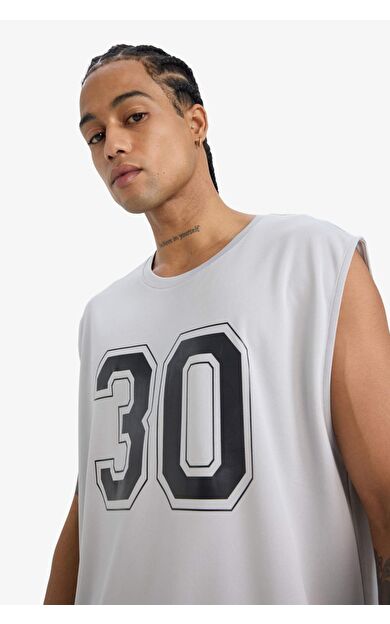 DeFactoFit Hızlı Kuruyan Nefes Alabilen Boxy Fit Baskılı Bisiklet Yaka Sporcu Atlet E4392AX25HSGR91