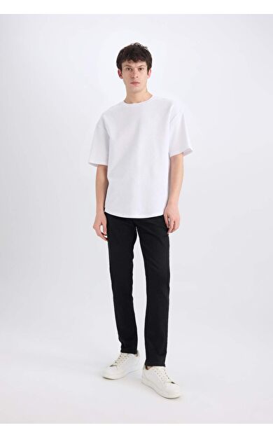 DeFacto Carlo Skinny Fit Ekstra Dar Kalıp Normal Bel Ekstra Dar Paça Jean Pantolon E7445AX25SPNM40