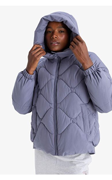 DeFactoFit Su İtici Oversize Fit Geniş Kalıp Kapüşonlu Fermuarlı Cepli Şişme Mont