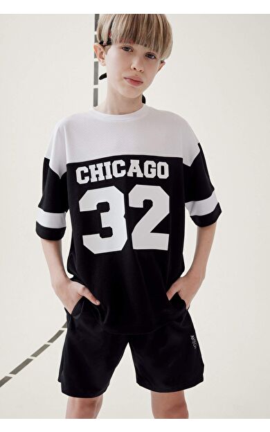 DeFacto Erkek Çocuk Oversize Geniş Kalıp Bisiklet Yaka Baskılı Renk Bloklul Kısa Kollu Tişört