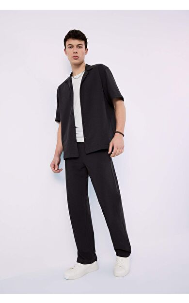 DeFacto Bol Rahat Kesim Wide Leg Üç Cepli Geniş Paça Yazlık Pantolon F3147AX25SPAR104