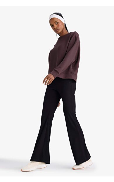 DeFactoFit Flare Fit Toprlayıcı Yüksek Bel İspanyol Paça Standart Boy Ribana Sporcu Pantolon F5040AX25WNBK81