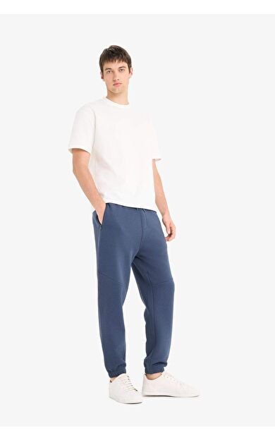 DeFacto Regular Fit Beli Bağcıklı İçi Yumuşak Tüylü Paçası Lastikli Baskılı Fermuar Cepli Eşofman Altı