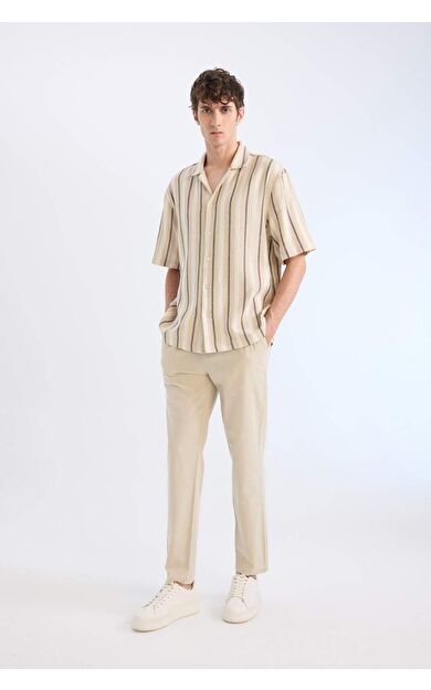 DeFacto Yazlık Jogger Pantolon Pamuklu Dar Paça Beli Bağcıklı Lastikli Cepli Z6475AZ25SPBG700