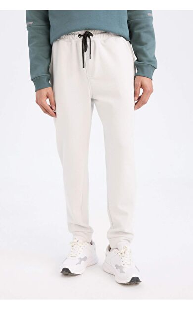 DeFactoFit Jogger Eşofman Altı Slim Fit Dar Kesim Skuba Dalgıç Kumaş Lastikli Paça Beli Bağcıklı Cepli